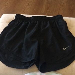 Women’s all black Nike running shorts